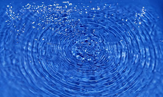 Concentric circles of ripples on water.