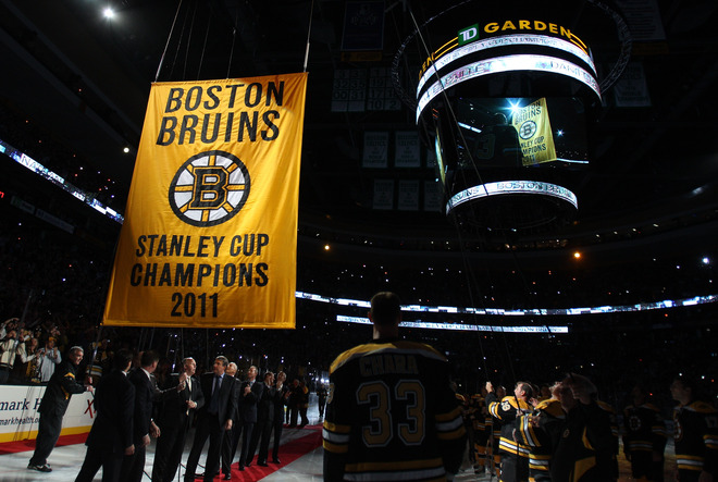 Boston Bruins raise their 2011-11 Stanley Cup Championship banner