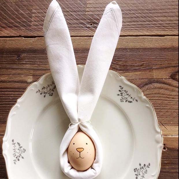 hand like Peeps and jellybeans in an egg basket 26+ Chic and Traditional Easter Decorating Ideas To DIY in 2019