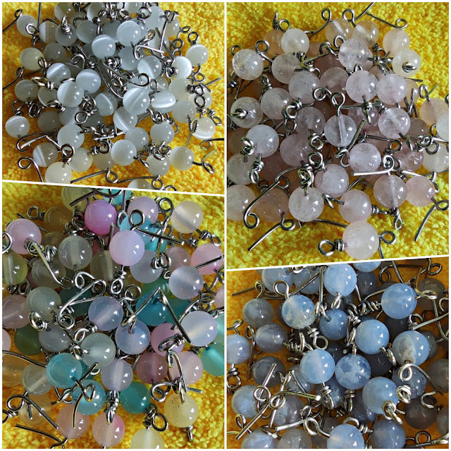 Collection of wire wrapped gemstones beads in various colors