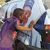 Meet A Little Boy Who Kisses Buhari's Picture