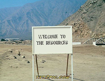 A sign stands in a barren desert reads "Welcome to the Resources".