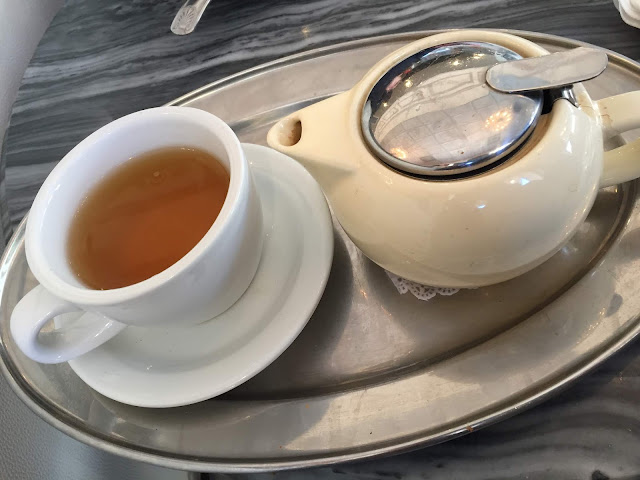 Pot of loose leaf green tea at Patisserie Coralie in Evanston, Illinois