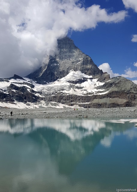 The mirror image of the Matterhorn in a lake of the Theodul glacier.