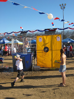 Kid throwing at the Dunk Tank