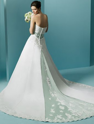 The Wedding Gown with long tails of brocade's luxurious white silk