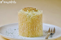 Timbal de parmentier con boloñesa y crujiente de queso