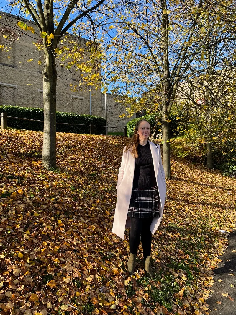 Autumn Leave, Tartan Skirts, And A Warm Coat
