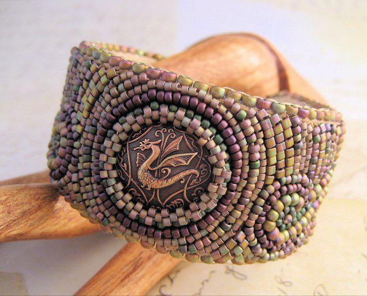 Bead embroidery dragon bracelet by Sherri Stokey.