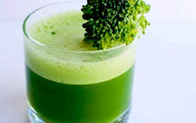 Celery juice amongst broccoli