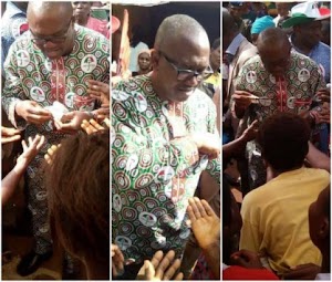 Former Governor Peter Obi spotted sharing money ahead of Anambra governorship election