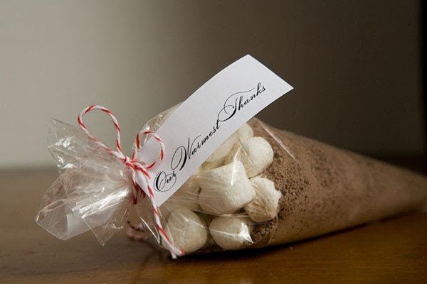 Giving your guests a cozy wedding favors for your winter themed wedding is a