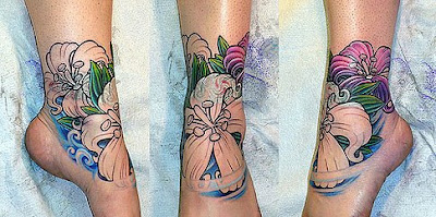 Flower tattoo design in foot