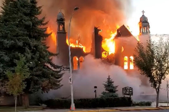 Catholic church arson crime vandalism Canada