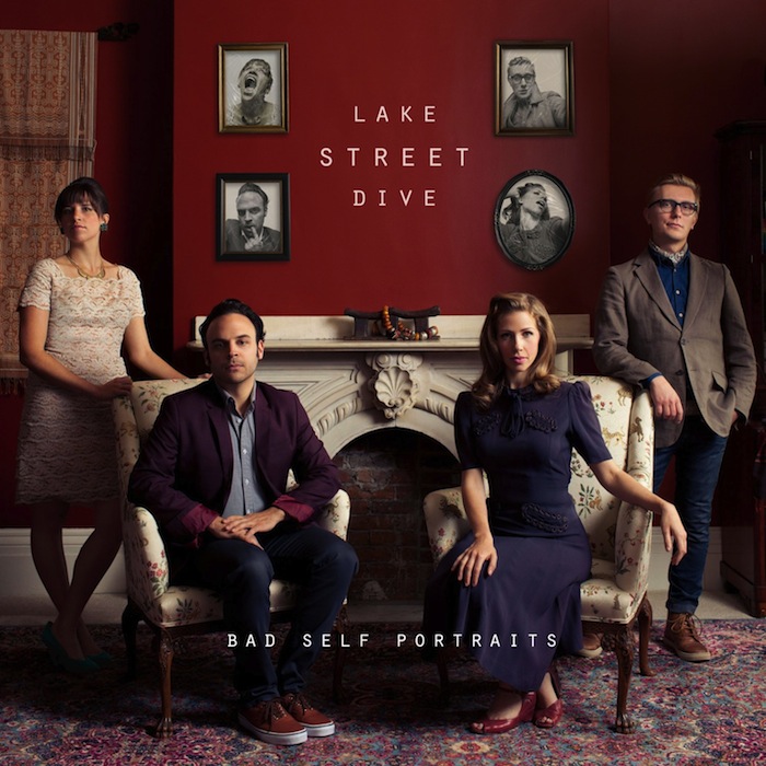 Cover to Lake Street Dive album 'Bad Self-Portraits' — members posing stiffly in a drawing room in front of wall adorned with photos of them making goofy faces