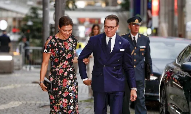 Crown Princess Victoria wore a floral print silk blend dress by Dolce & Gabbana. Princess Sofia wore Andiata wide-leg pants