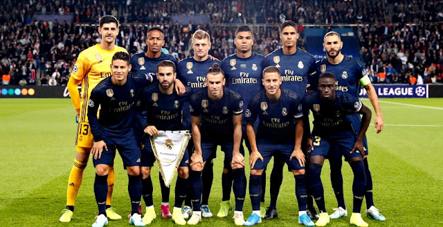 REAL MADRID C. F. Temporada 2019-20. Thibaut Courtois, Militao, Toni Kroos, Casemiro, Varane, Benzema. James Rodríguez, Carvajal, Bale, Eden Hazard, Mendy.  PARIS SAINT-GERMAIN F. C. 3 REAL MADRID C. F. 0. 18/09/2019. Liga de Campeones de la UEFA, fase de grupos, Grupo A, jornada 1. París, Francia, estadio del Parque de los Príncipes (40.000 espectadores). GOLES: 1-0: Di María (14’). 2-0: Di María (33’). 3-0: Meunier (90+1’).