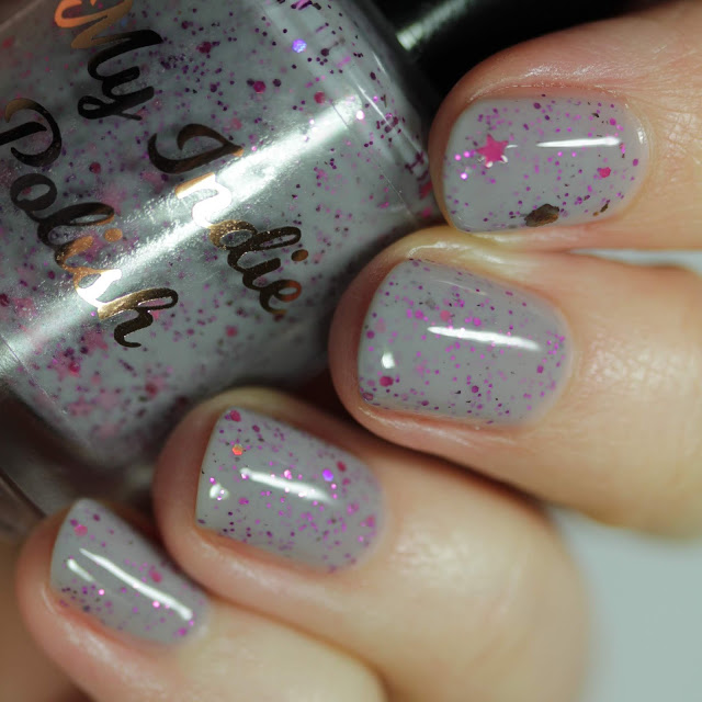 grey nail polish with berry pink glitters and star glitters