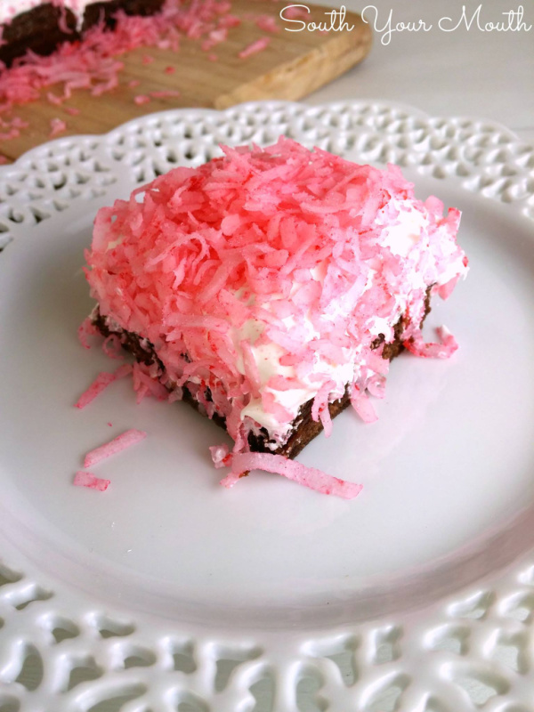 Sno Ball Brownies! An easy recipe for fudgy brownies, marshmallow buttercream and coconut just like the classic Hostess Sno Ball snack cakes!