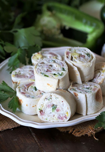 Pineapple-Ham Tortilla Roll-Ups On a Plate Image