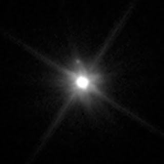 Moon Orbiting the Dwarf Planet Makemake