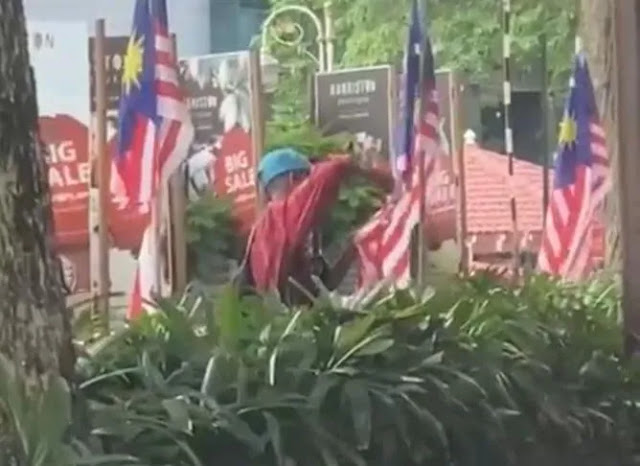 Lelaki gunting Jalur Gemilang dicari polis