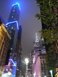 Tall building, lots of lights in New York City