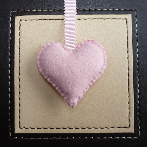 The reverse side of a handsewn hand stitched hanging decoration