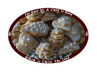 Christmas cookie trees, stars and hearts with confectioners sugar spinkled on top