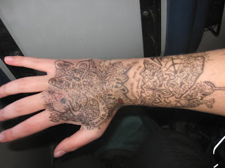 http://designertattooyakuza.blogspot.com/-designer-writing-tattoos-yakuza.html