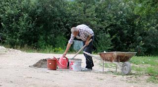 Sally mixing yet more cement