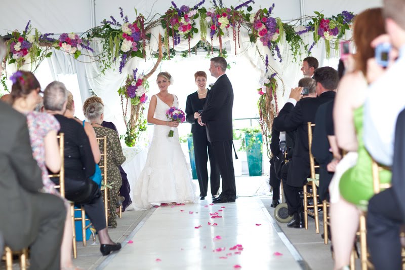 Peluso married this handsome couple under a tent on the roof of the chic 