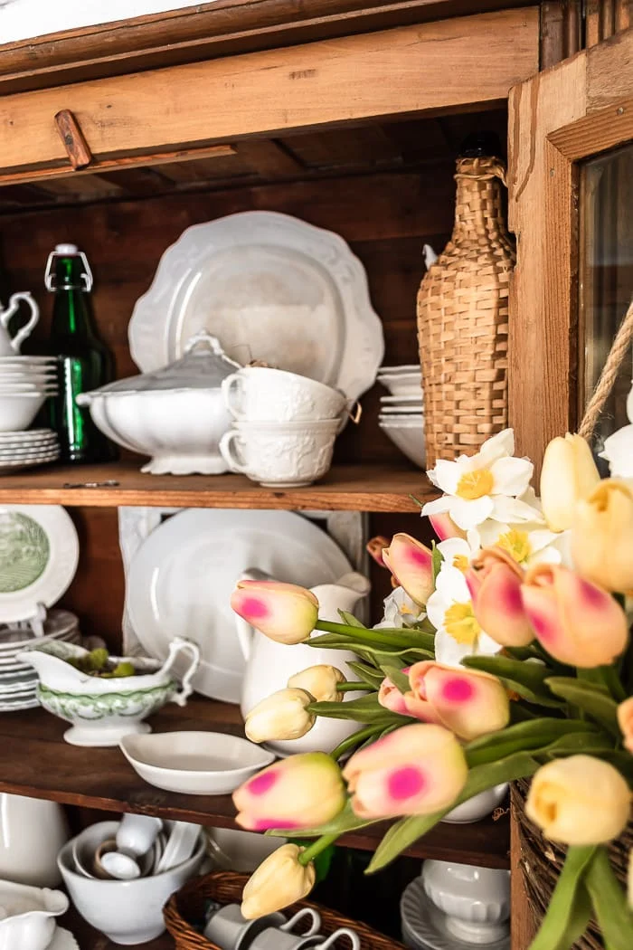 faux tulips spilling from hanging basket