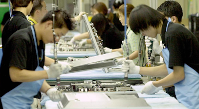 Workers at a Samsung Electronics factory in South Korea