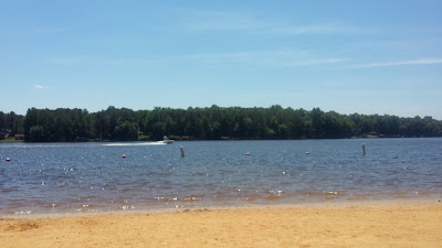 a beautiful day at the lake's beach.