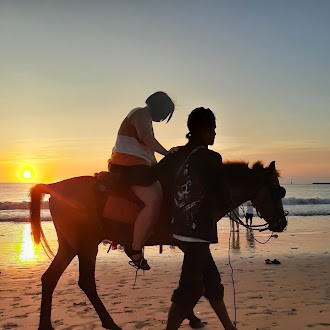 Riding a horse on Kedonganan Beach 