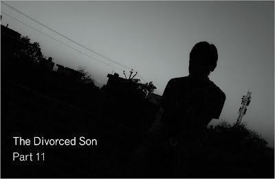 A monochromatic picture of a teenage boy walking alone through city streets. Text overlay reads: "The Divorced Son: Part 11"