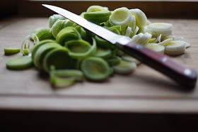 bunch of sliced leeks and the knife