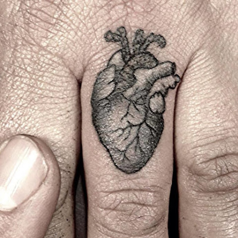 10 Romantic Wedding Ring Tattoo Ideas