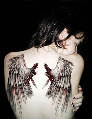 ﻿The wings on the back are often tattooed in most cases across the back, 