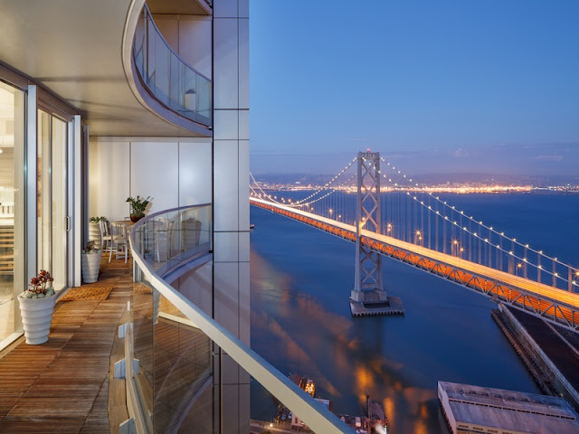 Picture of the bridge at sunset as seen from the balcony of small duplex apartment