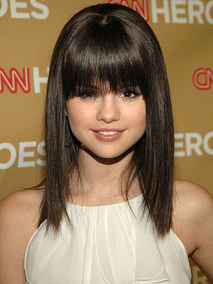 selena gomez haircut long. selena gomez fringe hairstyle.