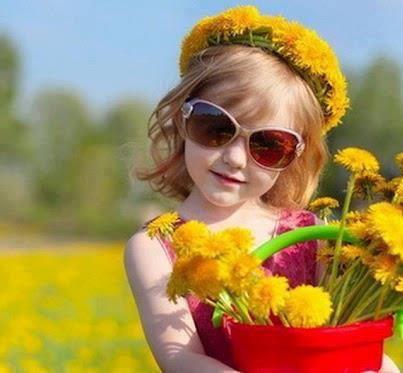 Baby Girl with Beautiful Yellow Flowers