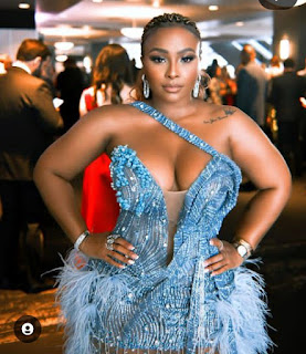 ''Beautiful dress' South African rapper and actress Boity Thulo flaunts her ample cleavage in lovely dress