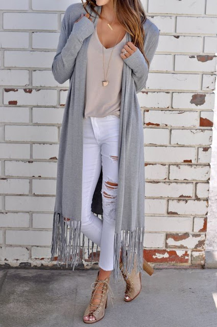 long sleeve duster cardigan featuring a fringed hem and an effortless maxi silhouette