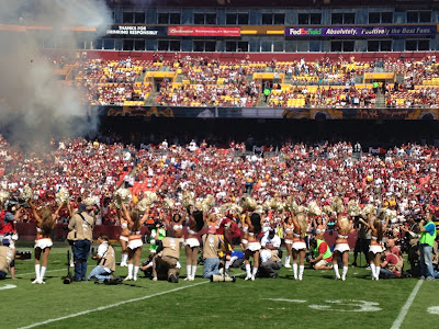 Robert Griffin III runs onto FedEx Field during Washington Redskins player introductions