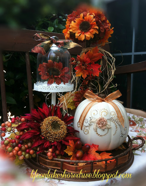 fall vignette pumpkin fall flowers cloche