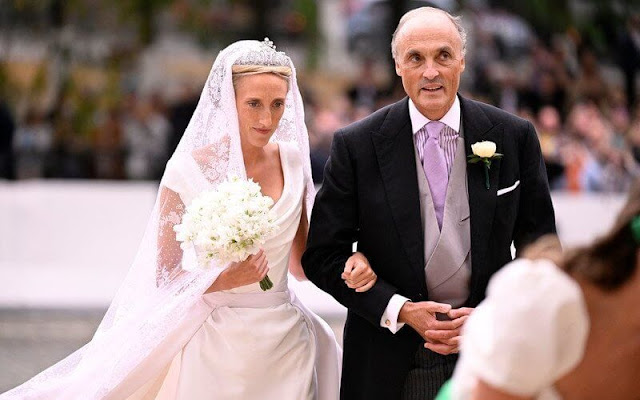 Princess Maria Laura wore a wedding gown by Vivienne Westwood. Princess Maria Laura is wearing her mother's Savoy-Aosta Tiara