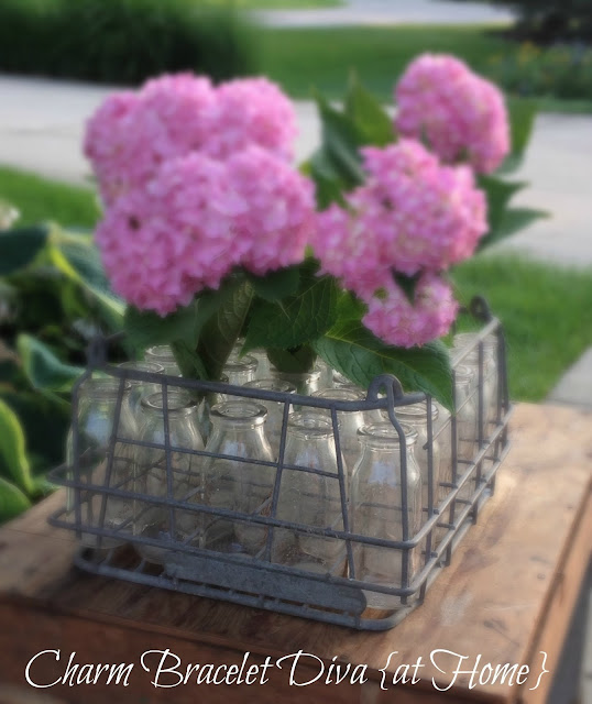 Hydrangeas vintage milk bottles floral arrangements