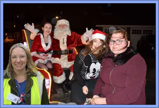 Danielle Hoynes (L), And The Santa Sleigh Volunteers